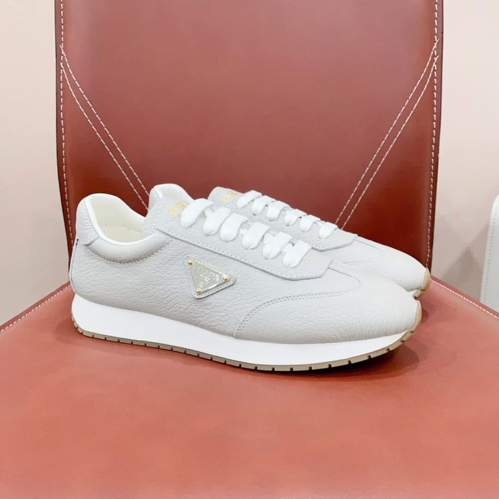 White Low-Top Sneakers with Textured Material and Thick Sole